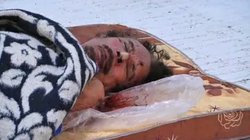Vystavené tělo Muammara Kaddáfího