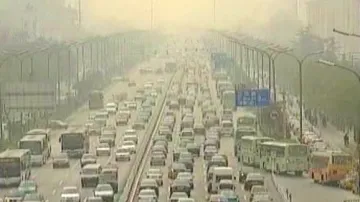 Smog z husté automobilové dopravy