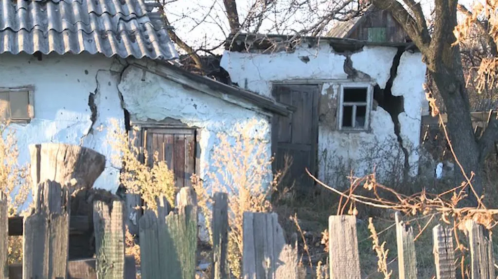 Zničené domy na Ukrajině