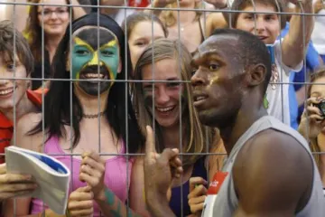 Zlatou tretru znovu ovládl Bolt, Špotáková skončila druhá