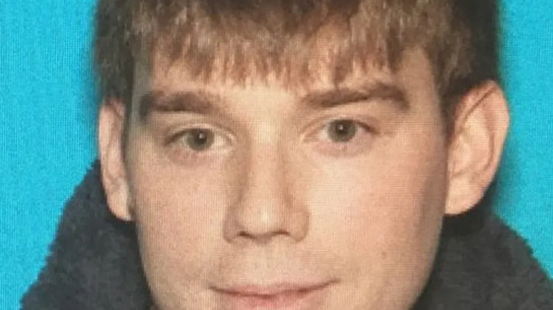 Podezřelý Travis Reinking