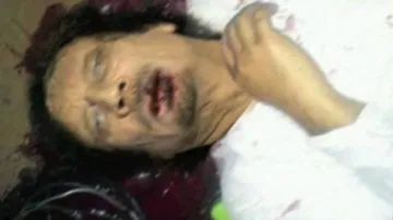 Mrtvý Muammar Kaddáfí