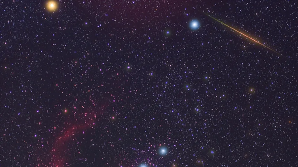 Souhvězdí Orionu a meteor z Halleyovy komety