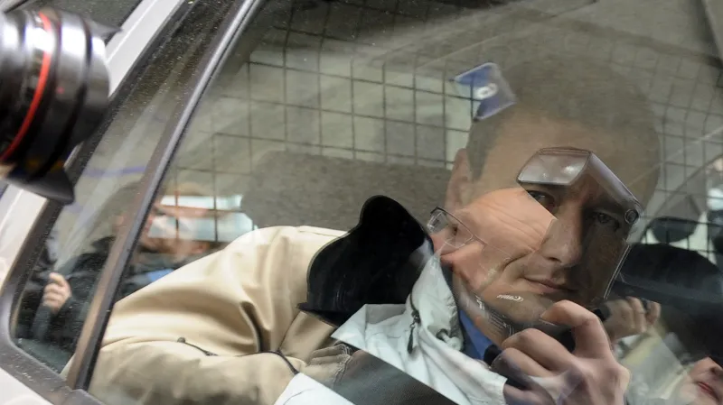 David Rath v policejním autě