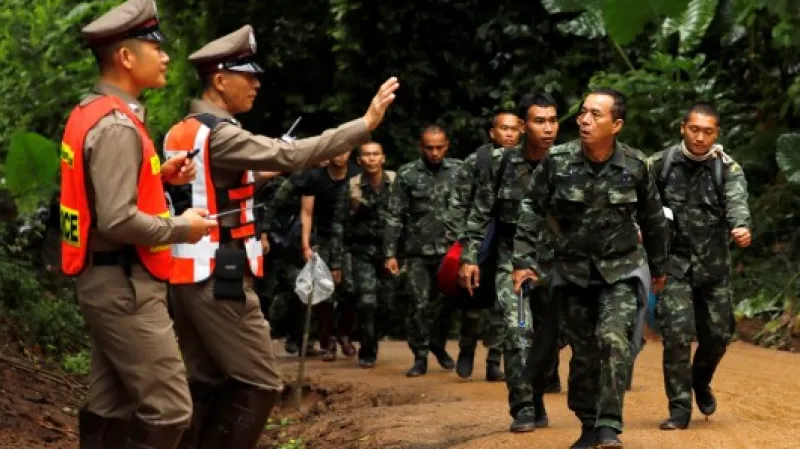 Thajští vojáci podílející se na záchraně chlapců z jeskynního komplexz,  Autor: Tyrone Siu,  Zdroj: REUTERS