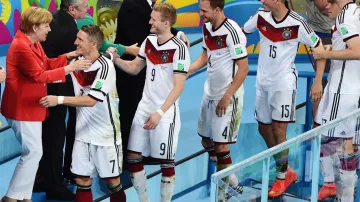 Angela Merkelová a Joachim Gauck blahopřejí čerstvým fotbalovým šampionům