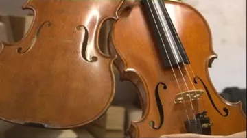 Model Stradivari versus model Guarneri