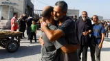 Palestinští pracovníci se vracejí z Izraele do Pásma Gazy