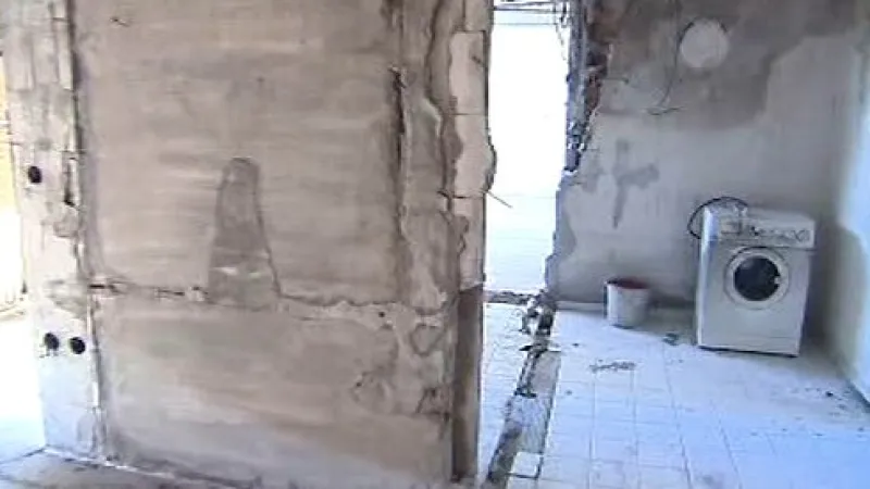 Poničený pečovatelský dům