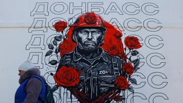 Podobizna horníka u nápisu Donbas v Ruskem okupované části Ukrajiny