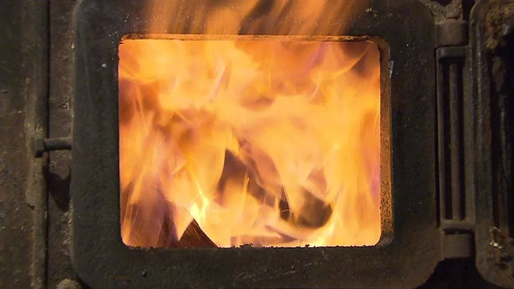 Topení v kamnech