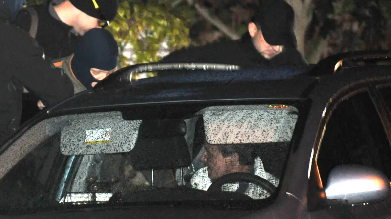 David Rath v policejním autě