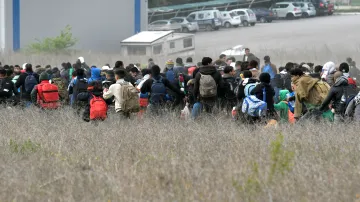Migranti u uprchlického tábora Diavata poblíž Soluně