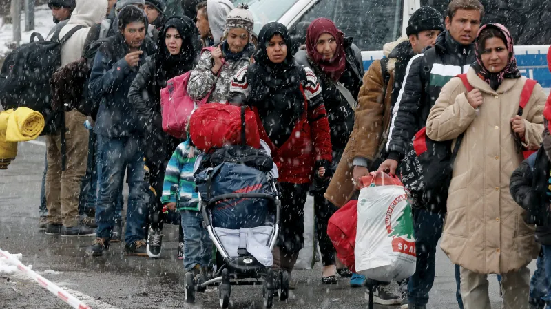 Migranti na rakousko-německé hranici