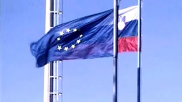 Vlajky EU a Slovinska