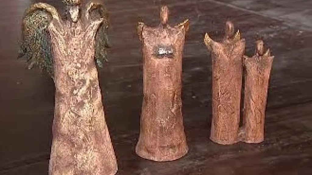 Andělé