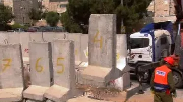 Odstraňování zdi kolem předměstí Gilo