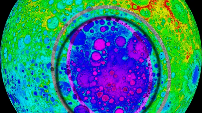 Kráter South Pole-Aitken na Měsíci a teploty kolem. Červená je teplejší, fialová studená