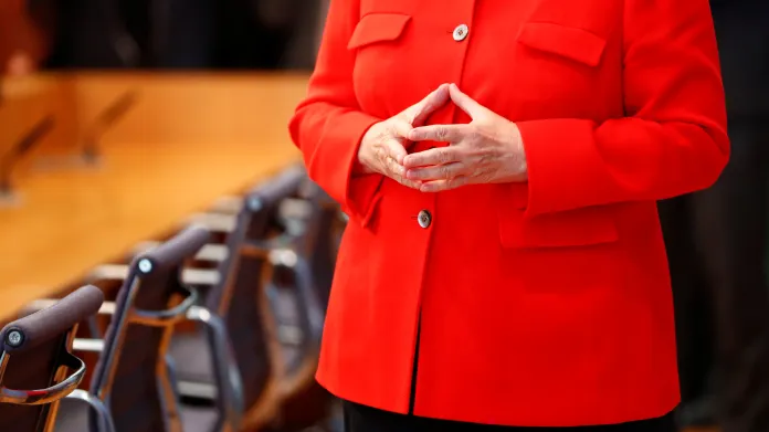 Angela Merkelová a její typické gesto