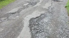Poškozená silnice