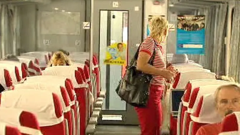 Cestující ve vlaku