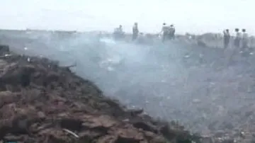 Kráter po pádu íránského letadla