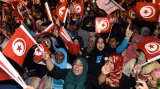 Sympatizanti Strany obnovy v ulicích Tunisu
