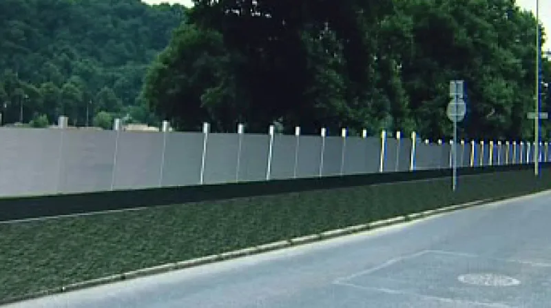 Domy v ústecké čtvrti Střekov by měl v budoucnu ochránit přírodní val a mobilní protipovodňové zábrany.