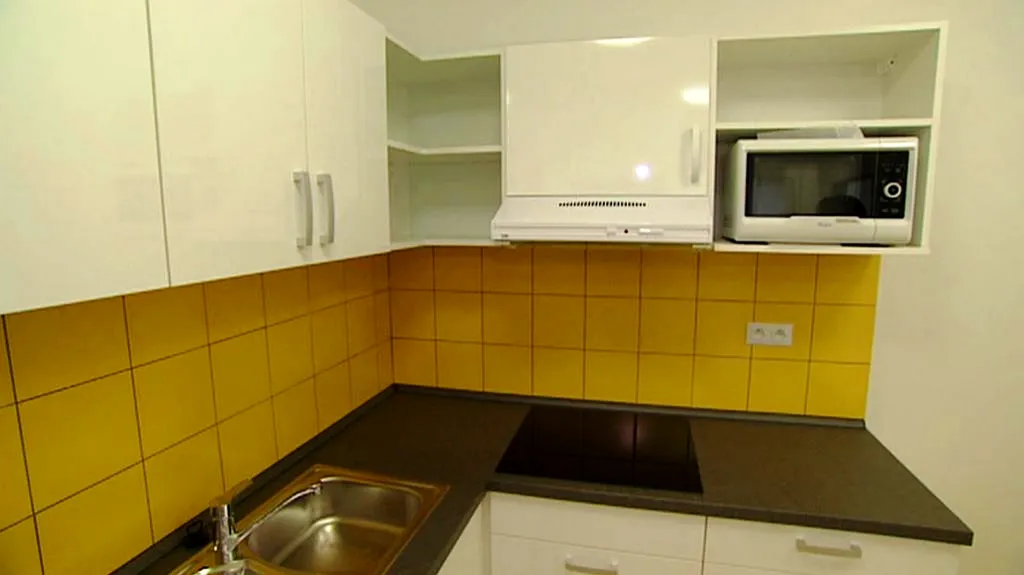 Kuchyně bytu pro studenty s rodinami